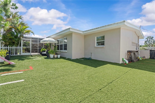 327 Sunny Ln, Belleair, FL 33756 - back of property featuring stucco siding