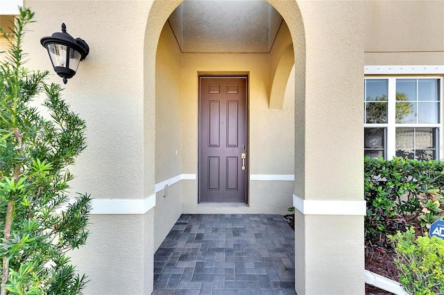 1192 Multiflora Loop, Lutz, FL 33558 - view of exterior entry with stucco siding