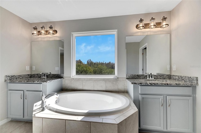 1192 Multiflora Loop, Lutz, FL 33558 - bathroom with a bath and two vanities