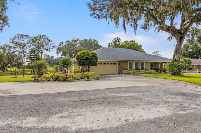 70 Arthur Ln, Winter Haven, FL 33880 - ranch-style home with a garage and driveway