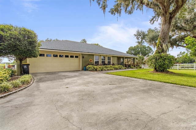 70 Arthur Ln, Winter Haven, FL 33880 - ranch-style house with a garage, concrete driveway, and stucco siding