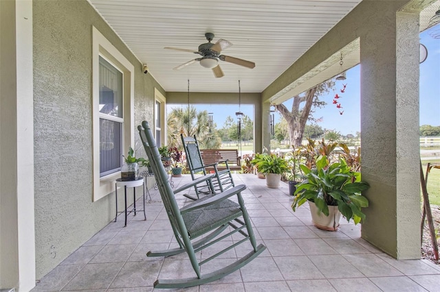 70 Arthur Ln, Winter Haven, FL 33880 - porch featuring a ceiling fan