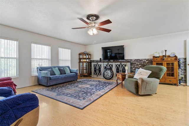 70 Arthur Ln, Winter Haven, FL 33880 - living area with a ceiling fan and wood finished floors