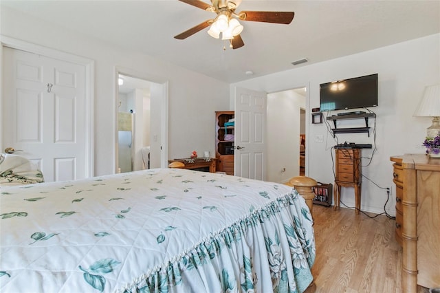 70 Arthur Ln, Winter Haven, FL 33880 - bedroom with light wood finished floors and ceiling fan