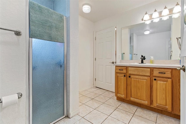 70 Arthur Ln, Winter Haven, FL 33880 - full bath with vanity, tile patterned floors, and a stall shower