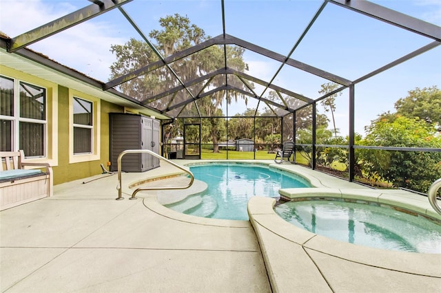 70 Arthur Ln, Winter Haven, FL 33880 - view of swimming pool featuring a patio, a pool with connected hot tub, and glass enclosure