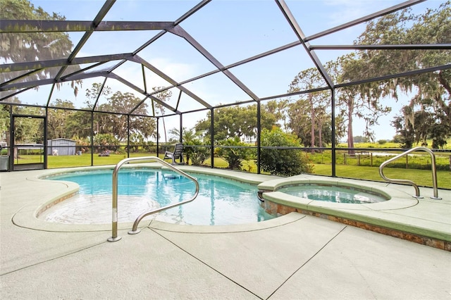 70 Arthur Ln, Winter Haven, FL 33880 - view of pool with a patio area, a yard, a pool with connected hot tub, and a lanai