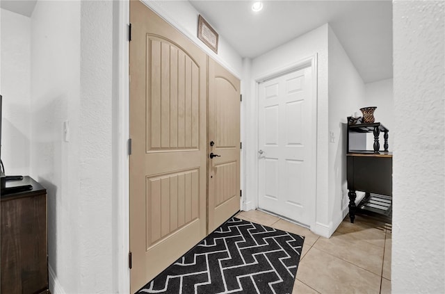 12402 84th Way, Largo, FL 33773 - foyer entrance featuring light tile patterned floors and recessed lighting