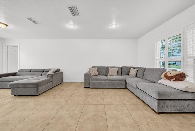 12402 84th Way, Largo, FL 33773 - living area with tile patterned floors and baseboards
