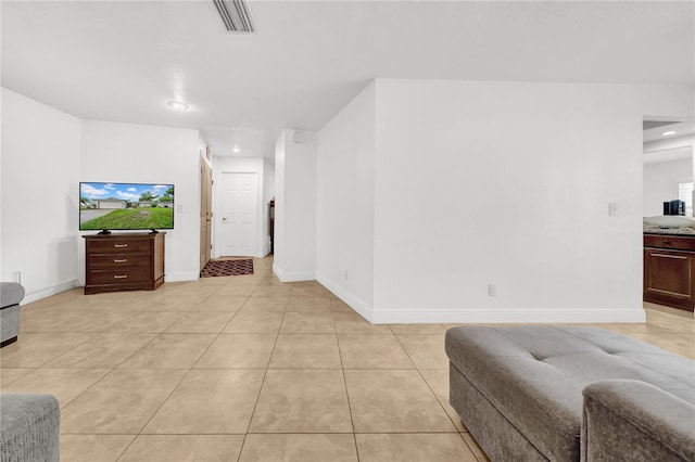 12402 84th Way, Largo, FL 33773 - living area featuring light tile patterned floors and recessed lighting