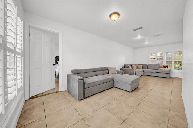 12402 84th Way, Largo, FL 33773 - living room featuring light tile patterned flooring