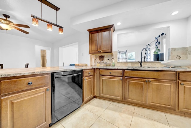 12402 84th Way, Largo, FL 33773 - kitchen with dishwasher, light countertops, light tile patterned flooring, decorative backsplash, and ceiling fan