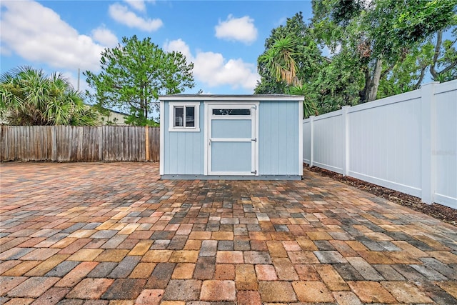 12402 84th Way, Largo, FL 33773 - view of shed featuring a fenced backyard