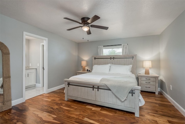 1762 Bayshore Blvd, Dunedin, FL 34698 - bedroom featuring wood finished floors, ensuite bath, and a ceiling fan