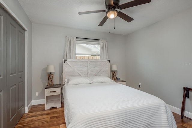 1762 Bayshore Blvd, Dunedin, FL 34698 - bedroom featuring a closet, wood finished floors, and ceiling fan