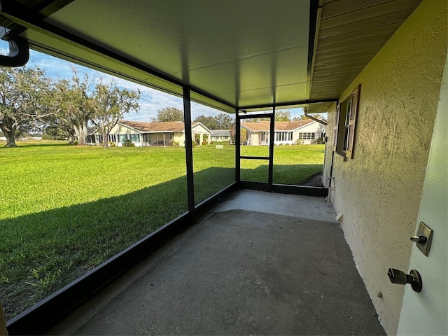 405 Gladstone Pl Unit 0, Sun City Center, FL 33573 - unfurnished sunroom with a residential view