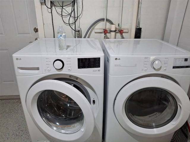 450 82nd Ave, St Pete Beach, FL 33706 - laundry room featuring washing machine and dryer