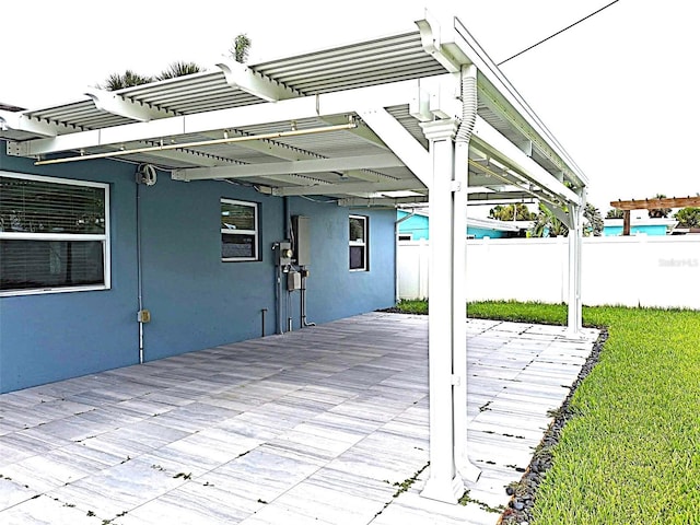 450 82nd Ave, St Pete Beach, FL 33706 - view of patio featuring a pergola and a deck