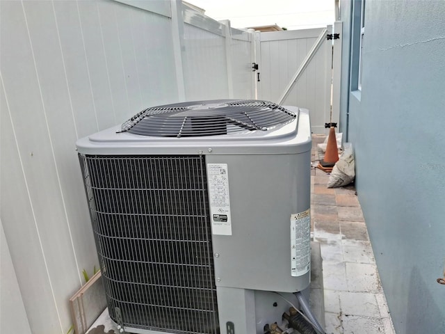 450 82nd Ave, St Pete Beach, FL 33706 - exterior view of a cooling unit and a gate