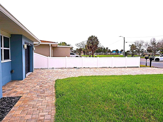 450 82nd Ave, St Pete Beach, FL 33706 - view of yard featuring a patio