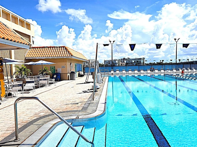 450 82nd Ave, St Pete Beach, FL 33706 - community pool featuring a patio