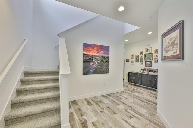 6215 Voyagers Pl, Apollo Beach, FL 33572 - stairs featuring recessed lighting and wood finished floors