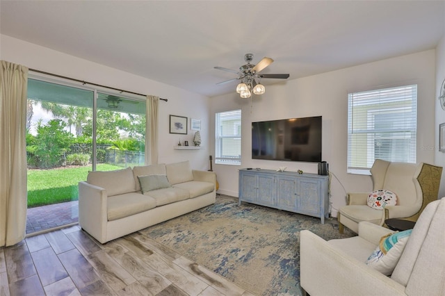 6215 Voyagers Pl, Apollo Beach, FL 33572 - living room with ceiling fan and wood finished floors