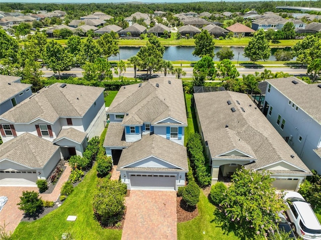 6215 Voyagers Pl, Apollo Beach, FL 33572 - aerial perspective of suburban area with a nearby body of water