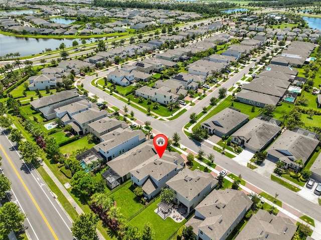 6215 Voyagers Pl, Apollo Beach, FL 33572 - aerial perspective of suburban area with a nearby body of water