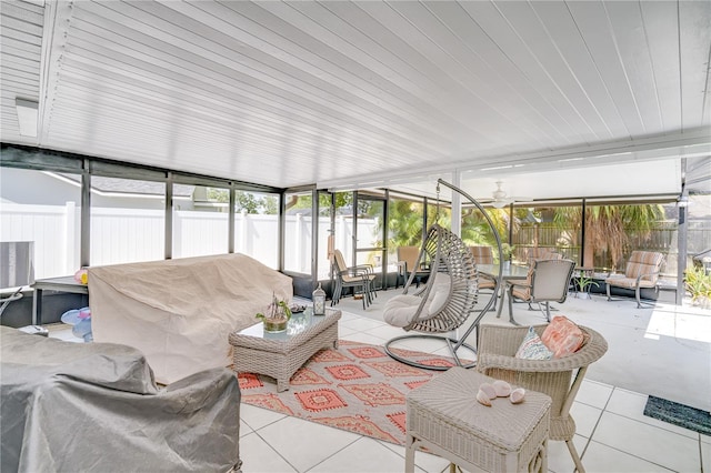 1954 Arvis Cir W, Clearwater, FL 33764 - sunroom / solarium with outdoor dining space, outdoor lounge area, and ceiling fan