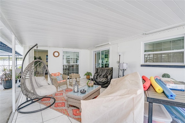 1954 Arvis Cir W, Clearwater, FL 33764 - sunroom featuring tile patterned floors