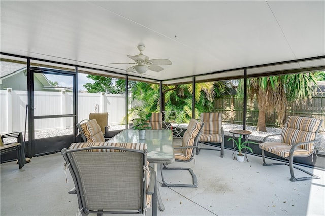 1954 Arvis Cir W, Clearwater, FL 33764 - sunroom / solarium featuring a ceiling fan and outdoor dining area