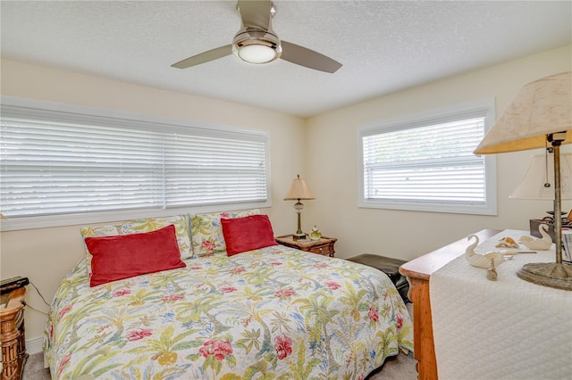 1954 Arvis Cir W, Clearwater, FL 33764 - carpeted bedroom with ceiling fan and a textured ceiling