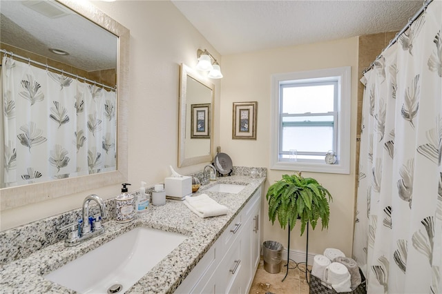 1954 Arvis Cir W, Clearwater, FL 33764 - full bathroom featuring double vanity, a textured ceiling, and a shower with curtain