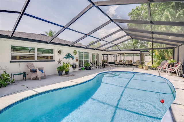 1954 Arvis Cir W, Clearwater, FL 33764 - swimming pool with a patio and glass enclosure
