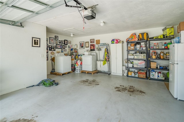 1954 Arvis Cir W, Clearwater, FL 33764 - garage with a garage door opener, washer and dryer, and freestanding refrigerator