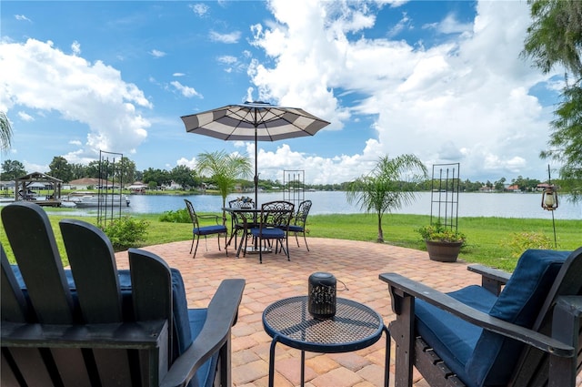 3539 Lake Padgett Dr, Land O Lakes, FL 34639 - view of patio / terrace with a water view and outdoor dining space