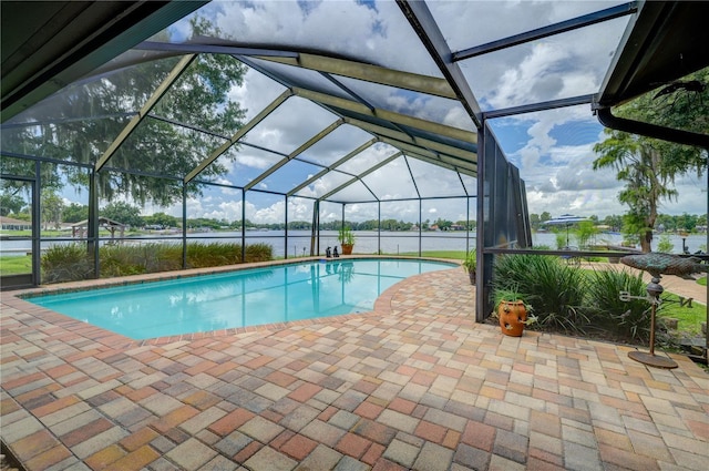 3539 Lake Padgett Dr, Land O Lakes, FL 34639 - swimming pool with a water view, a patio area, and a lanai