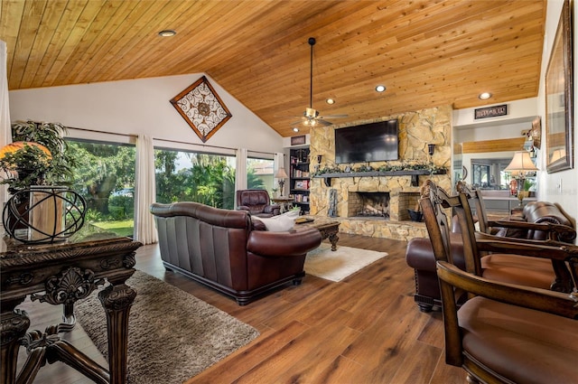 3539 Lake Padgett Dr, Land O Lakes, FL 34639 - living area with wooden ceiling, high vaulted ceiling, healthy amount of natural light, ceiling fan, and a fireplace