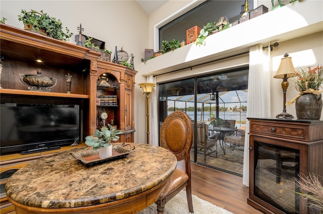 3539 Lake Padgett Dr, Land O Lakes, FL 34639 - dining room featuring wood finished floors and lofted ceiling