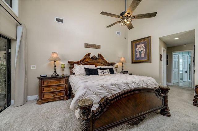 3539 Lake Padgett Dr, Land O Lakes, FL 34639 - carpeted bedroom with a high ceiling and ceiling fan
