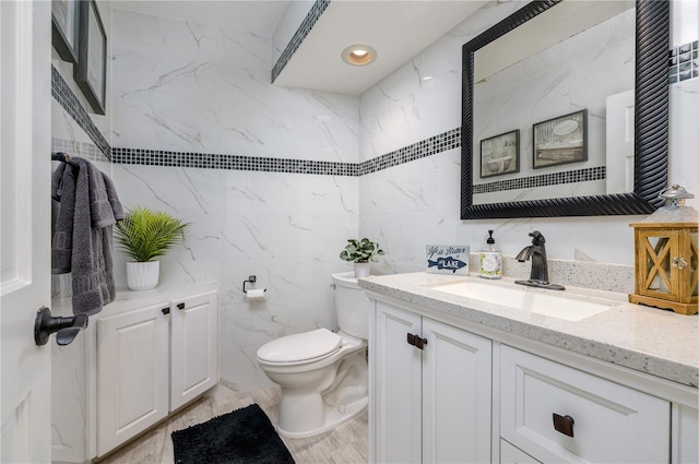 3539 Lake Padgett Dr, Land O Lakes, FL 34639 - bathroom featuring tile walls and vanity
