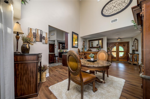 3539 Lake Padgett Dr, Land O Lakes, FL 34639 - dining room featuring wood finished floors and a high ceiling