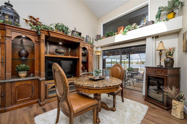 3539 Lake Padgett Dr, Land O Lakes, FL 34639 - dining room with wood finished floors and high vaulted ceiling
