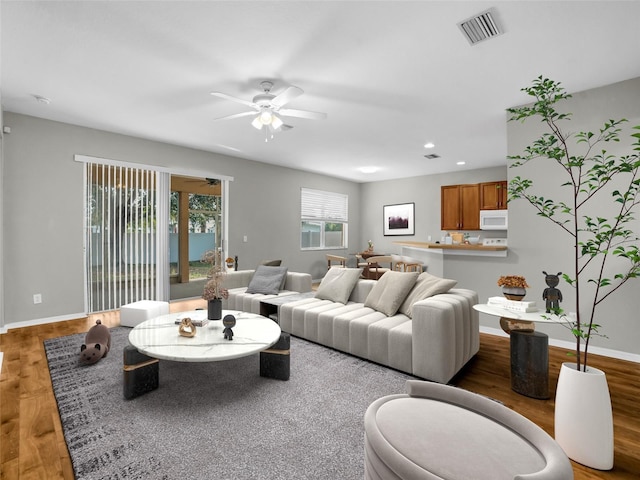 11212 Laurel Brook Ct, Riverview, FL 33569 - living room featuring light wood-style floors, ceiling fan, and recessed lighting