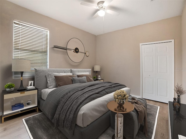 11212 Laurel Brook Ct, Riverview, FL 33569 - bedroom with wood finished floors and ceiling fan