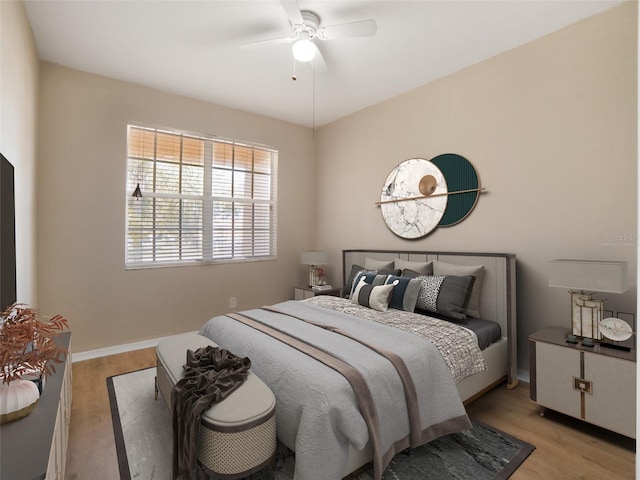 11212 Laurel Brook Ct, Riverview, FL 33569 - bedroom featuring light wood-type flooring and ceiling fan