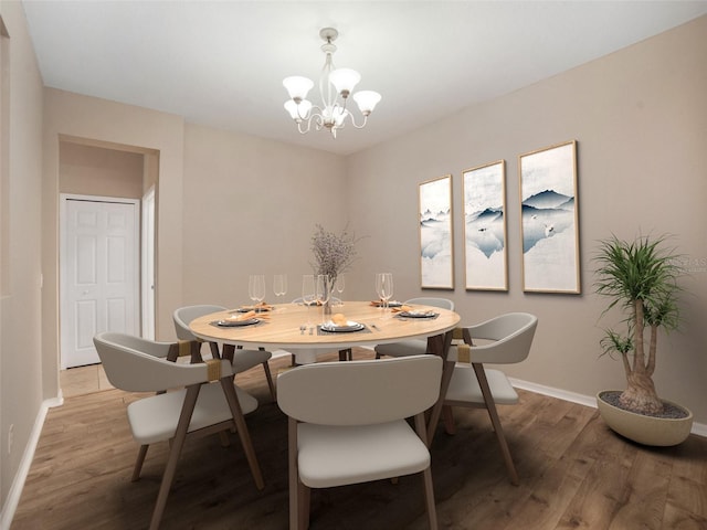 11212 Laurel Brook Ct, Riverview, FL 33569 - dining area featuring wood finished floors and a chandelier