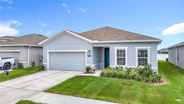35428 Crescent Creek Dr, Zephyrhills, FL 33541 - ranch-style house featuring stucco siding, an attached garage, a front yard, concrete driveway, and roof with shingles