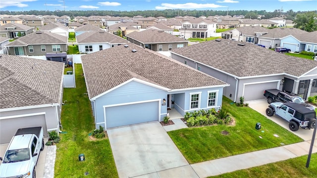 35428 Crescent Creek Dr, Zephyrhills, FL 33541 - view of front of house featuring a residential view, an attached garage, driveway, and a front lawn